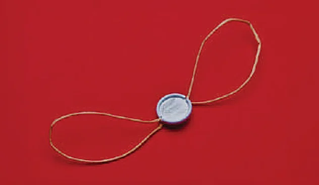 Recyclable metal and paper seal