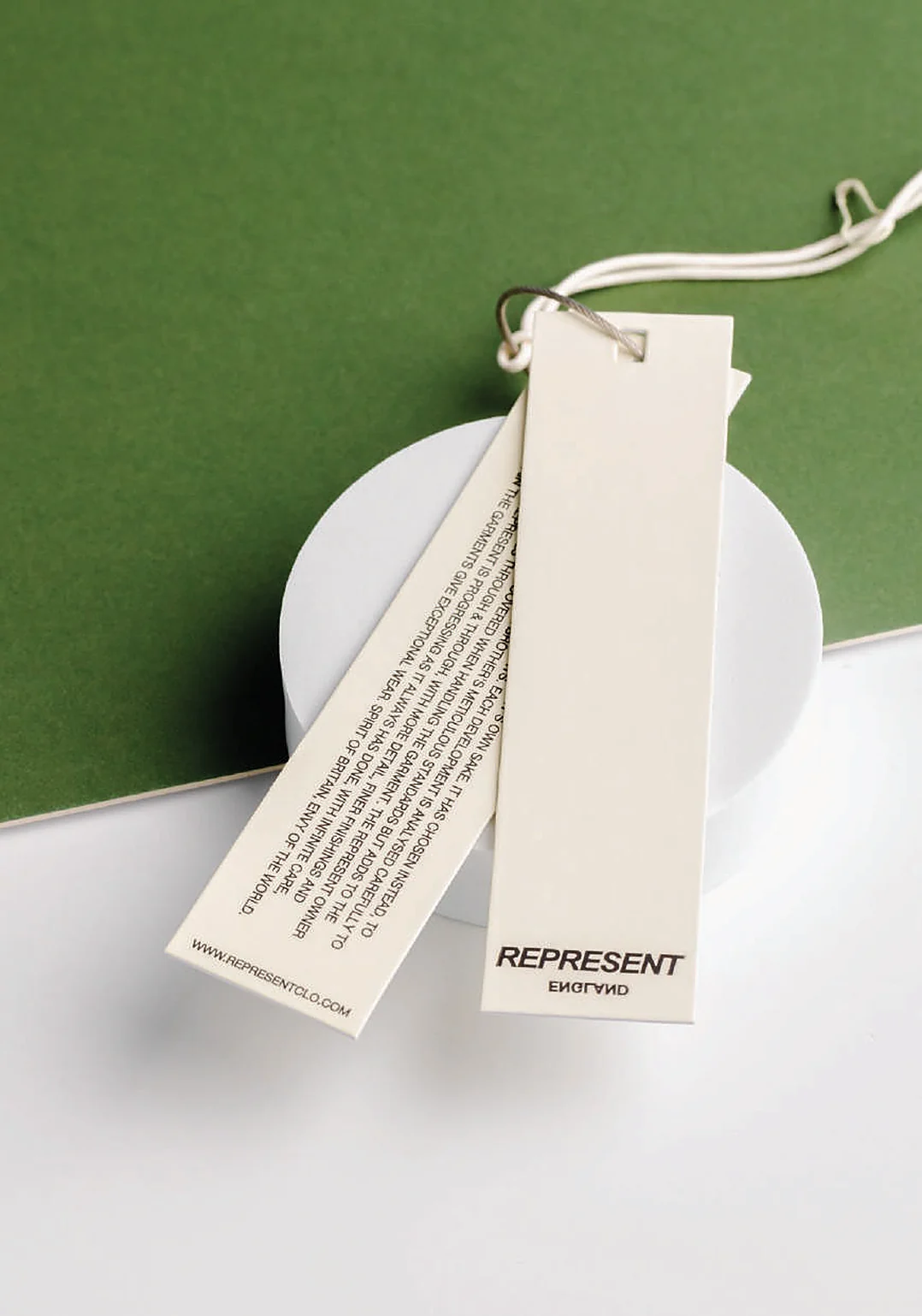 Recycled paper swing tags on a cotton string